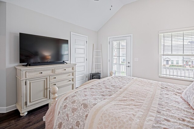 bedroom featuring baseboards, vaulted ceiling, dark wood finished floors, and access to exterior