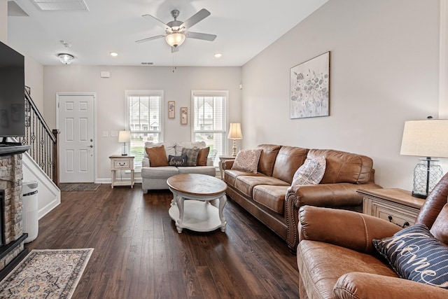 living area with stairs, a ceiling fan, baseboards, recessed lighting, and wood finished floors