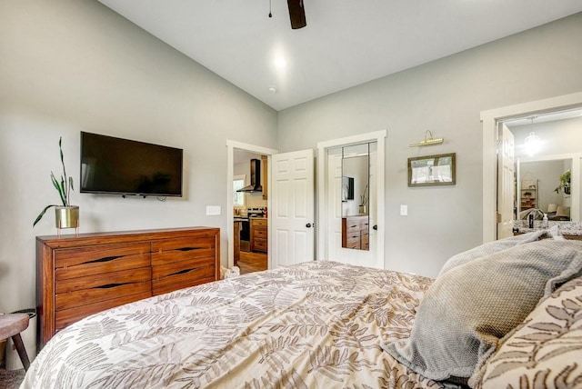 bedroom featuring ceiling fan and vaulted ceiling