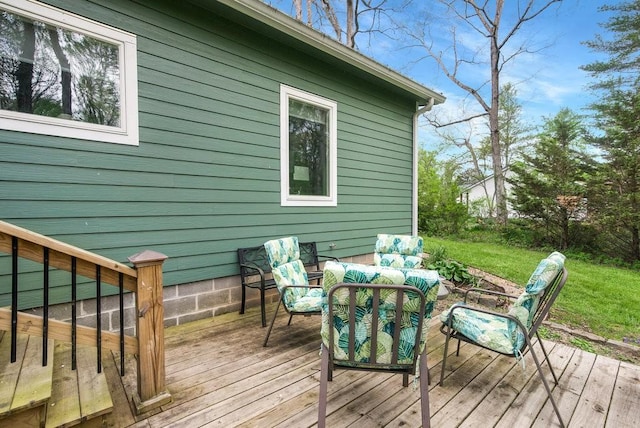 wooden deck featuring outdoor lounge area