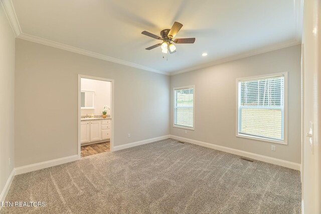 8888 Shaw Ferry Rd, Lenoir City, TN 37772 - unfurnished room featuring light carpet, crown molding, baseboards, ceiling fan, and a sink