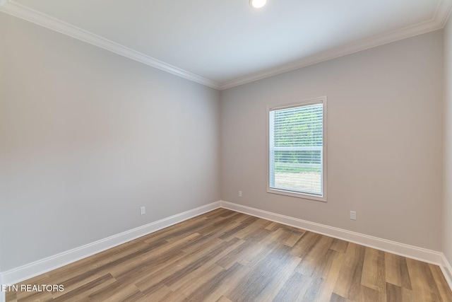 8888 Shaw Ferry Rd, Lenoir City, TN 37772 - empty room featuring baseboards, wood finished floors, ornamental molding, and recessed lighting