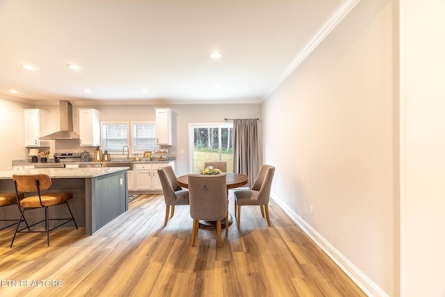 8888 Shaw Ferry Rd, Lenoir City, TN 37772 - dining area featuring light wood-style floors, crown molding, recessed lighting, and baseboards