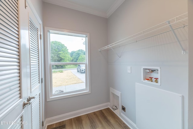 8888 Shaw Ferry Rd, Lenoir City, TN 37772 - laundry area with washer hookup, ornamental molding, wood finished floors, and baseboards