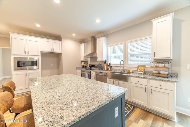 8888 Shaw Ferry Rd, Lenoir City, TN 37772 - kitchen with appliances with stainless steel finishes, wall chimney range hood, a sink, crown molding, and white cabinetry