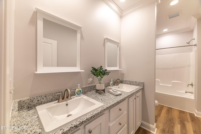 8888 Shaw Ferry Rd, Lenoir City, TN 37772 - bathroom featuring ornamental molding, toilet, wood finished floors, double vanity, and recessed lighting