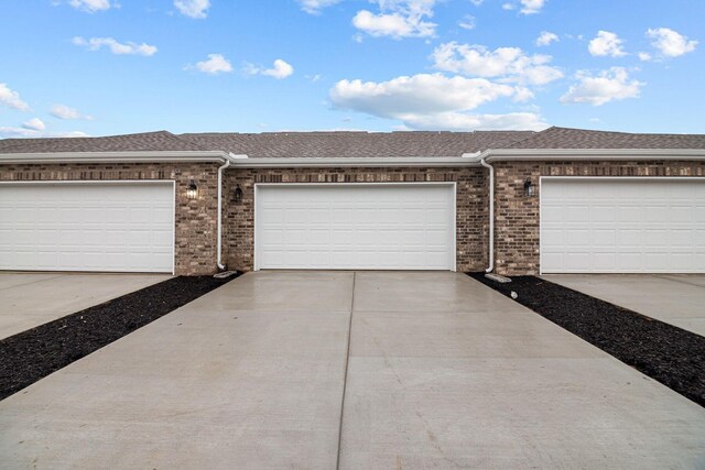 garage with driveway