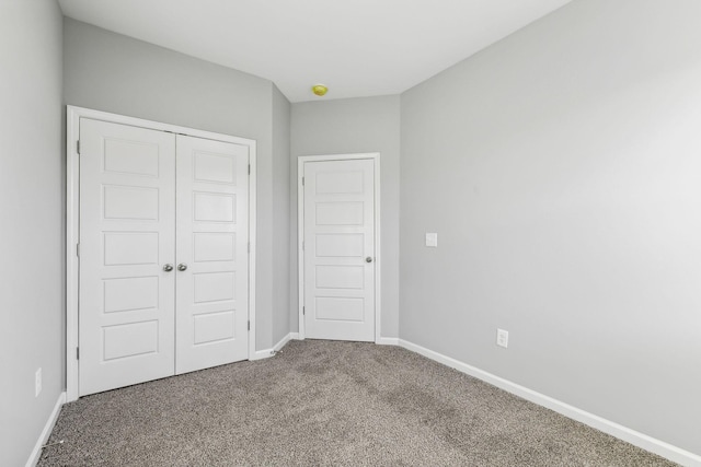 127 Floyd Jct, Lebanon, TN 37087 - unfurnished bedroom featuring a closet, carpet, and baseboards