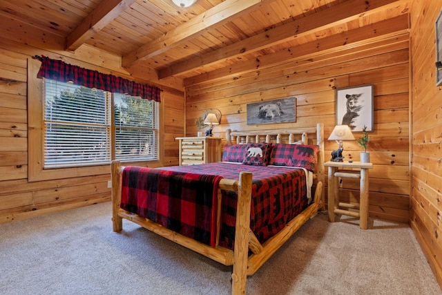 bedroom featuring wooden walls, beamed ceiling, carpet, and wooden ceiling