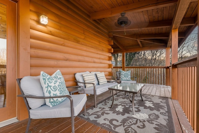 wooden terrace featuring outdoor lounge area
