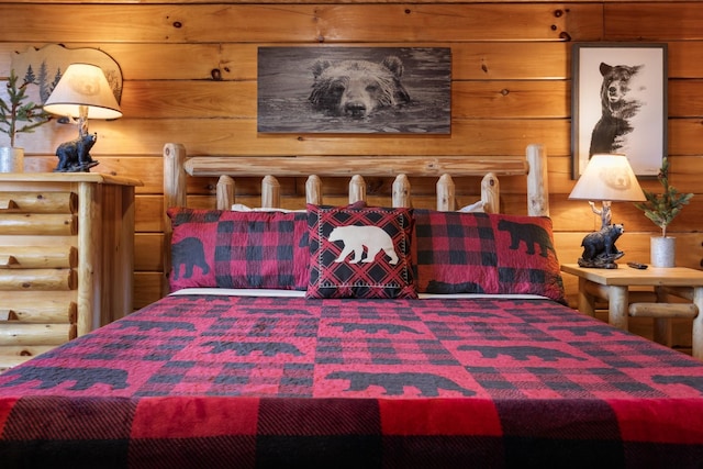 bedroom featuring rustic walls