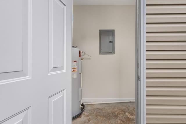 interior space featuring electric panel and electric water heater