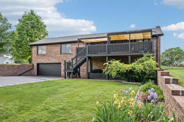 view of front of house featuring a front lawn, a deck, stairs, brick siding, and an attached garage
