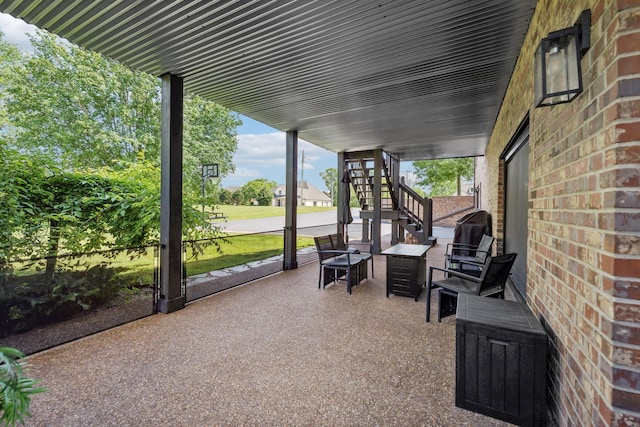 view of patio / terrace with stairway
