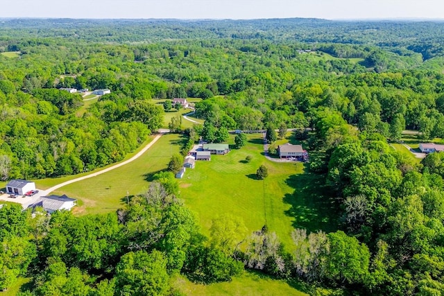 drone / aerial view with a view of trees
