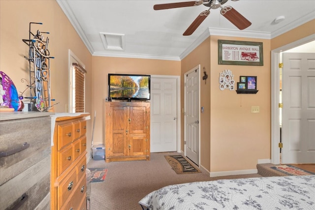 bedroom featuring crown molding, carpet flooring, and baseboards