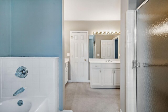 8508 Sawyer Brown Rd, Nashville, TN 37221 - bathroom with vanity, a bathing tub, and a shower stall