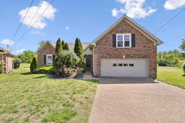 view of front facade with concrete driveway, brick siding, and a front yard