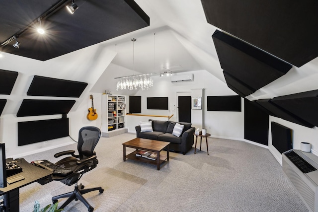 carpeted office featuring an AC wall unit, rail lighting, baseboards, and vaulted ceiling