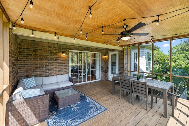deck featuring ceiling fan, an outdoor living space, and outdoor dining area