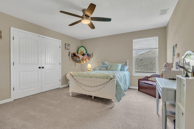 2095 Longhunter Chase Dr, Spring Hill, TN 37174 - carpeted bedroom with ceiling fan, visible vents, baseboards, and a closet