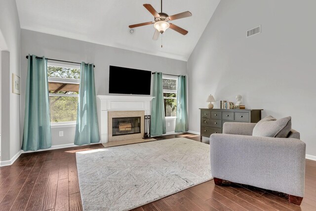 2095 Longhunter Chase Dr, Spring Hill, TN 37174 - living room featuring a high end fireplace, a ceiling fan, dark wood-style floors, and visible vents