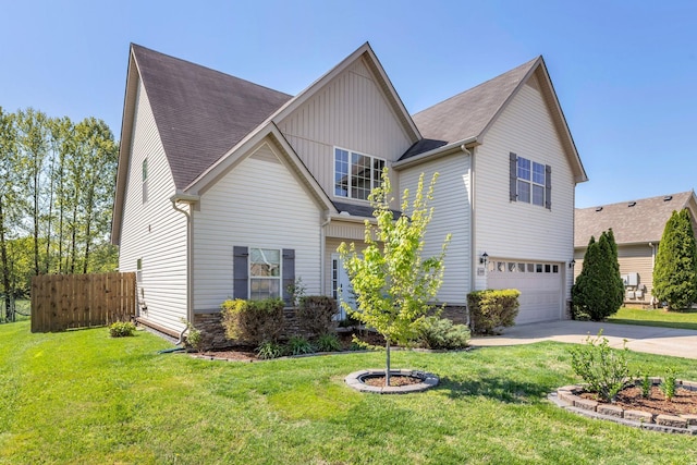 2095 Longhunter Chase Dr, Spring Hill, TN 37174 - traditional-style home featuring driveway, a front yard, fence, an attached garage, and a shingled roof