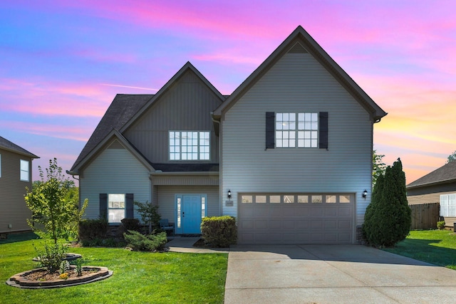 2095 Longhunter Chase Dr, Spring Hill, TN 37174 - traditional-style house featuring board and batten siding, an attached garage, driveway, and a front yard