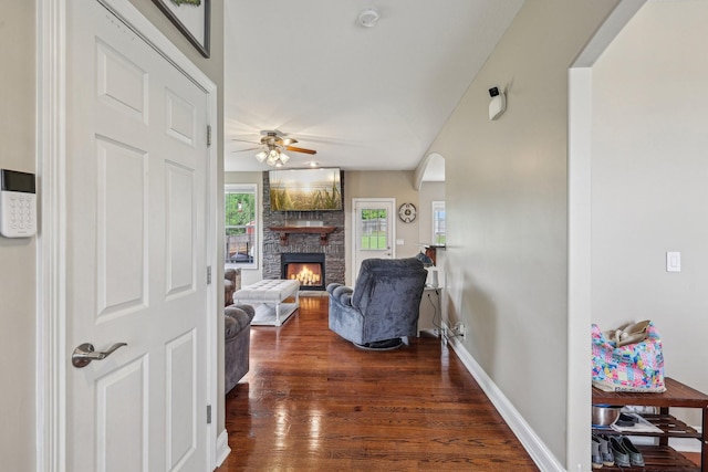 1792 Antler Rd, Woodlawn, TN 37191 - corridor featuring arched walkways, baseboards, and dark wood-style flooring