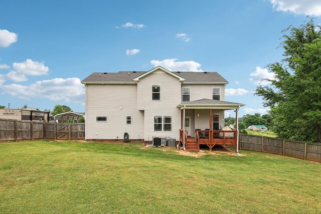 1792 Antler Rd, Woodlawn, TN 37191 - back of property featuring a fenced backyard, a wooden deck, a yard, and central AC