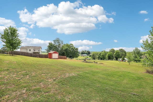 1792 Antler Rd, Woodlawn, TN 37191 - view of yard featuring fence, an outbuilding, a shed, and a garage