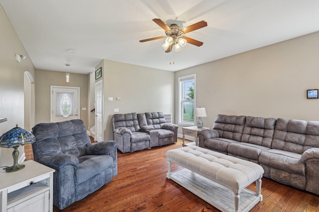 1792 Antler Rd, Woodlawn, TN 37191 - living room with a healthy amount of sunlight, arched walkways, a ceiling fan, and wood finished floors
