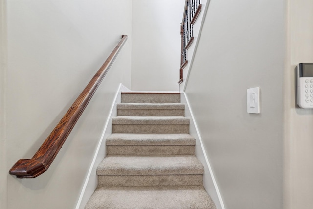 1792 Antler Rd, Woodlawn, TN 37191 - staircase featuring carpet flooring and baseboards