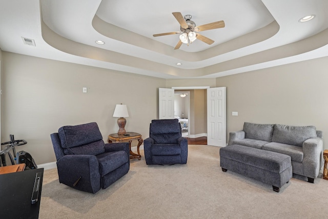 1792 Antler Rd, Woodlawn, TN 37191 - carpeted living room with a raised ceiling, a ceiling fan, baseboards, recessed lighting, and visible vents