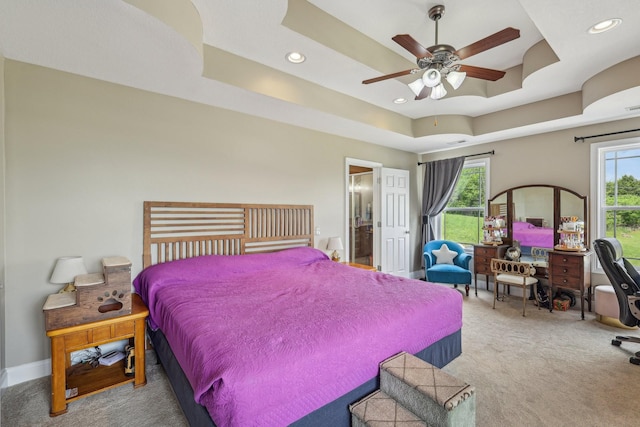 1792 Antler Rd, Woodlawn, TN 37191 - carpeted bedroom featuring connected bathroom, recessed lighting, ceiling fan, and a raised ceiling