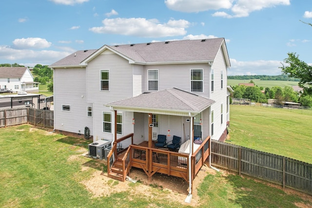 1792 Antler Rd, Woodlawn, TN 37191 - back of property featuring roof with shingles, a wooden deck, a yard, and a fenced backyard