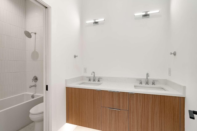 1017 12th Ave S Unit A, Nashville, TN 37203 - bathroom featuring shower / bath combination, a sink, and toilet