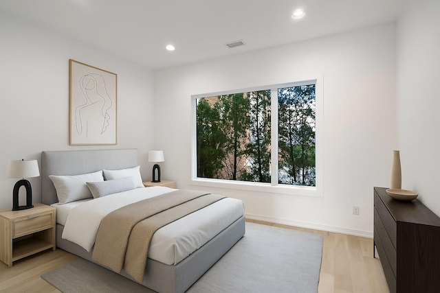 1017 12th Ave S Unit A, Nashville, TN 37203 - bedroom featuring light wood finished floors and recessed lighting