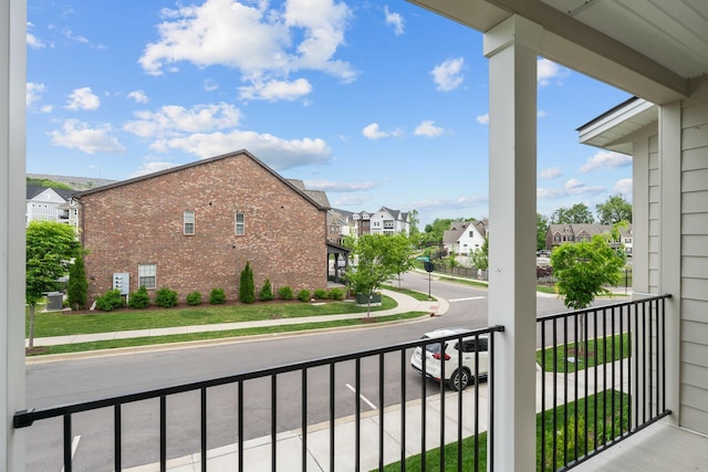 balcony featuring a residential view