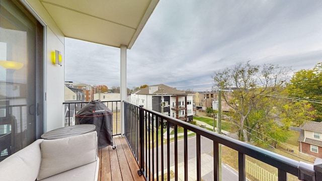 balcony featuring a residential view