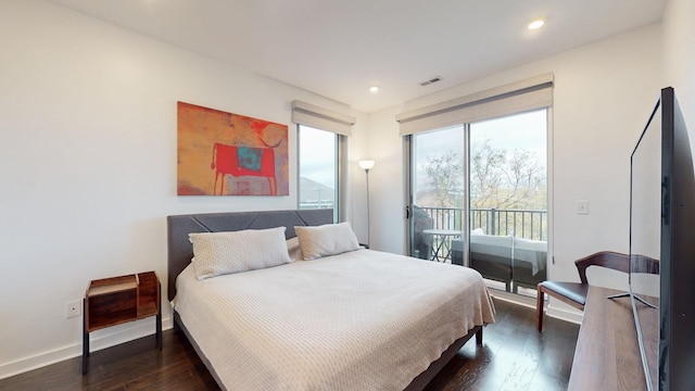 bedroom featuring access to exterior, recessed lighting, baseboards, visible vents, and dark wood-style floors