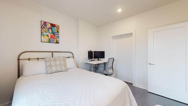 bedroom featuring recessed lighting and dark wood-type flooring