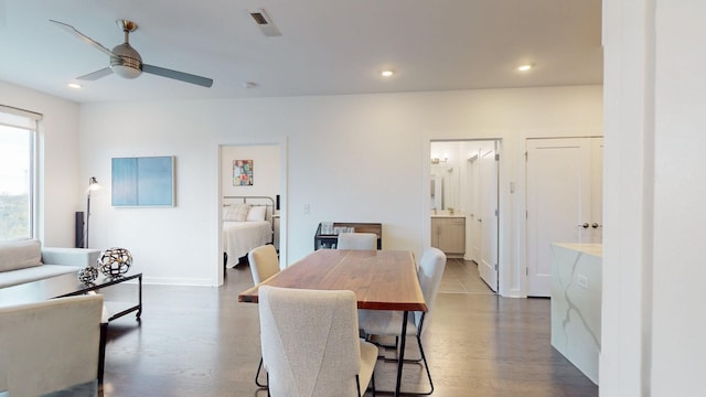 dining space featuring recessed lighting, a ceiling fan, dark wood finished floors, and visible vents