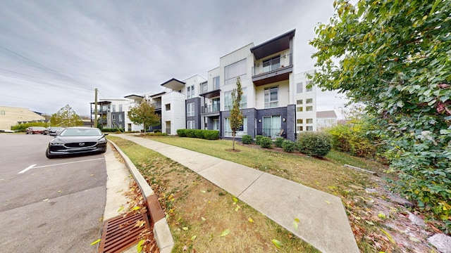 exterior space featuring sidewalks and curbs