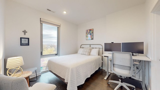 bedroom featuring recessed lighting, visible vents, multiple windows, and dark wood finished floors