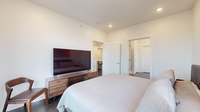 bedroom featuring recessed lighting, baseboards, and wood finished floors