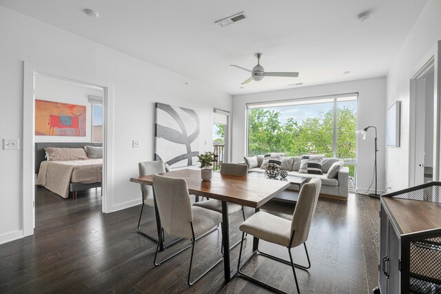 3116 W End Cir Unit 310, Nashville, TN 37203 - dining space featuring a ceiling fan, dark wood-type flooring, and baseboards