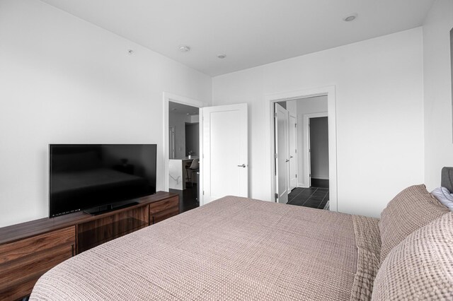 3116 W End Cir Unit 310, Nashville, TN 37203 - bedroom with dark tile patterned flooring