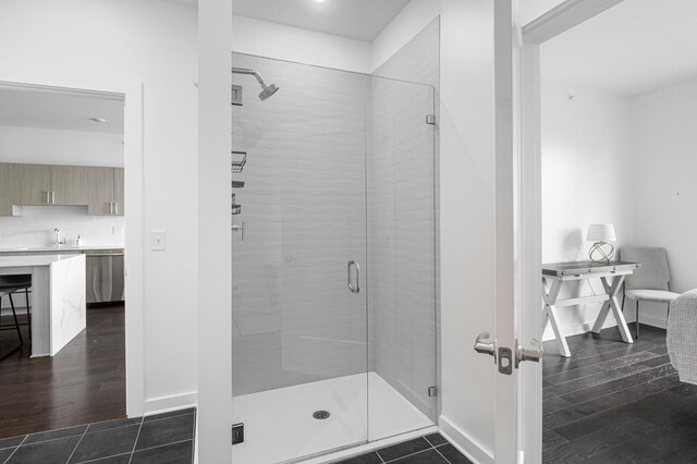 3116 W End Cir Unit 310, Nashville, TN 37203 - bathroom with a shower stall, wood finished floors, and vanity