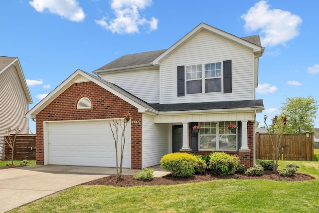 traditional-style home with fence, covered porch, an attached garage, and brick siding